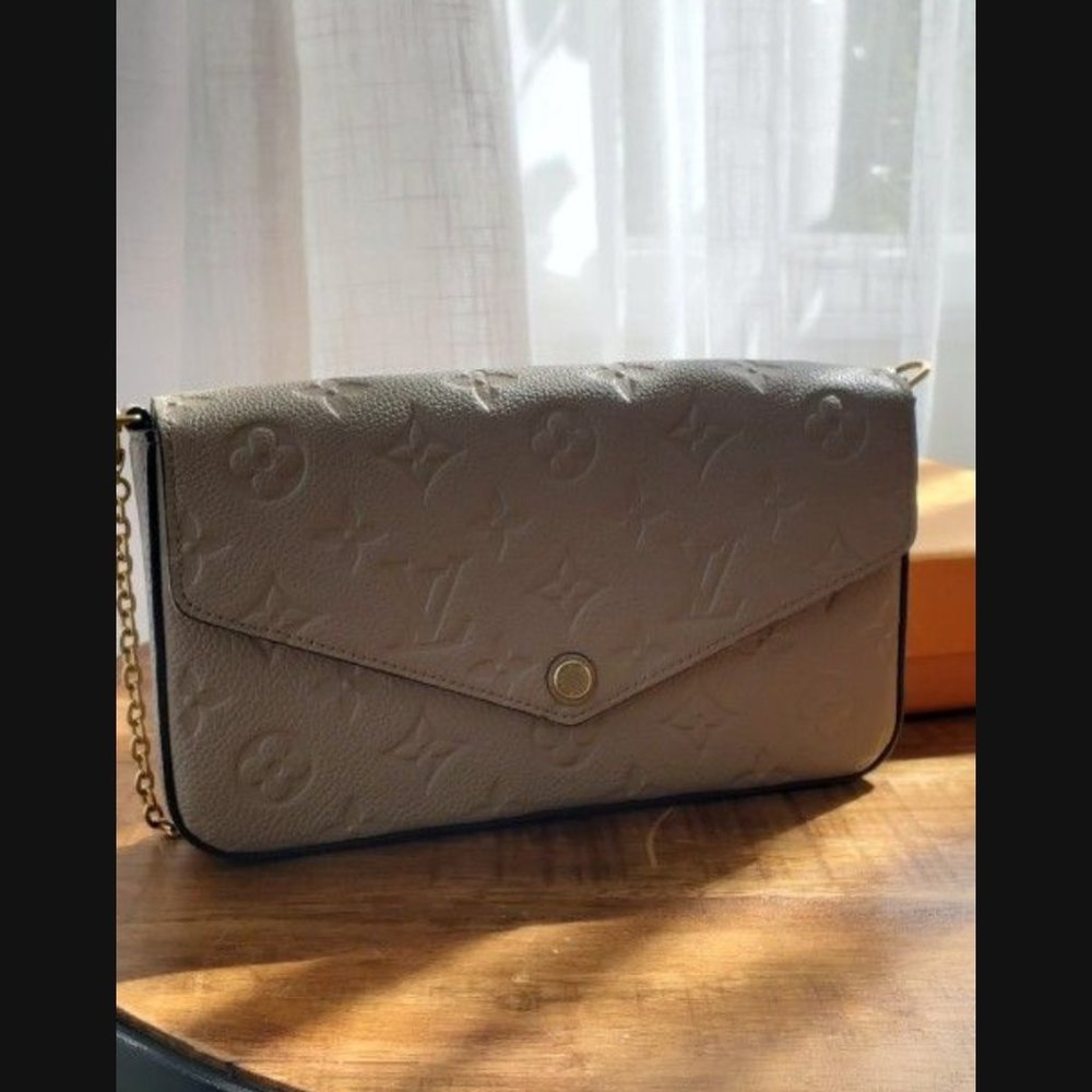 Authentic Louis Vuitton Tan Cross bag with Gold Chain